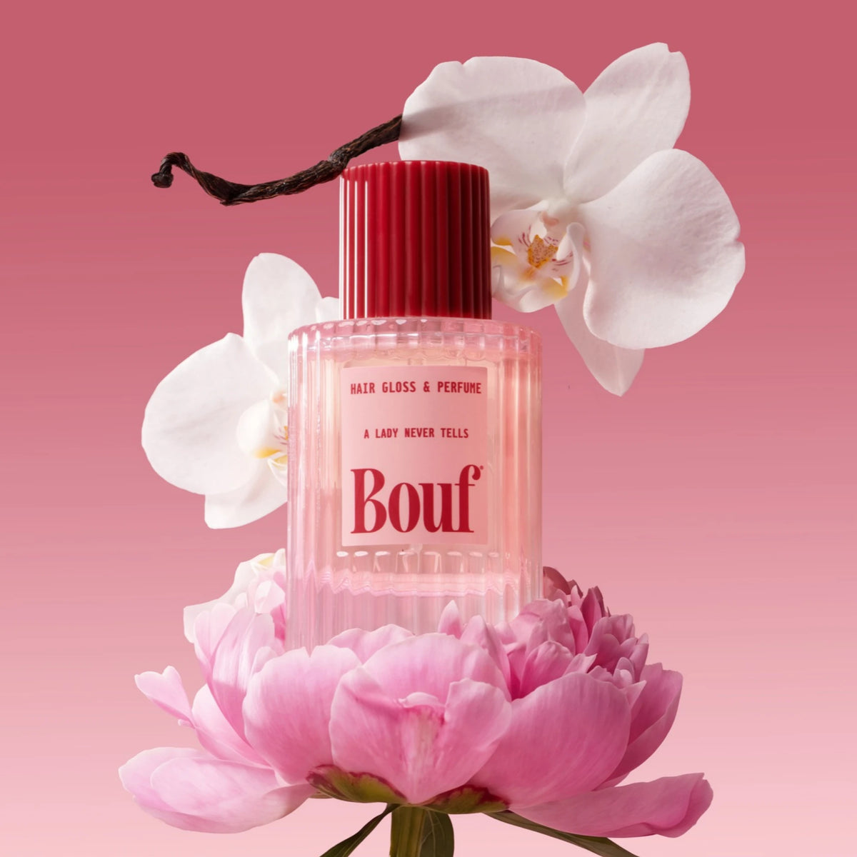 Bouf Hair Glass & Perfume bottle styled on a pink peony with white orchids and vanilla bean against a pink gradient background.