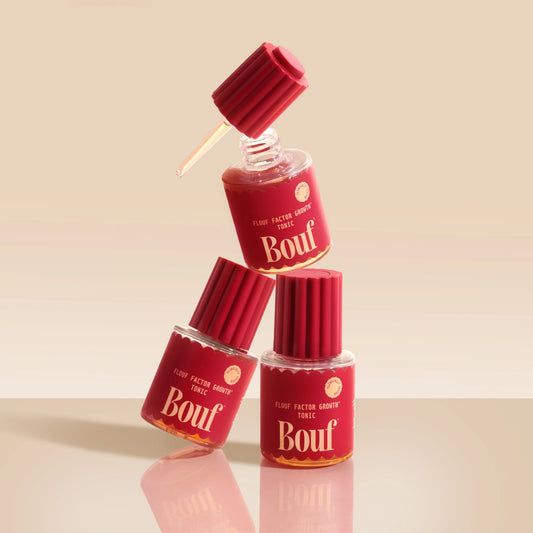 Three red bottles labeled 'Bouf' on a beige background